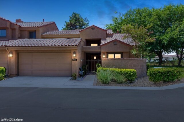 view of front of house with a garage