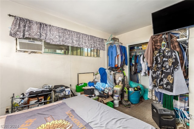 carpeted bedroom featuring a closet