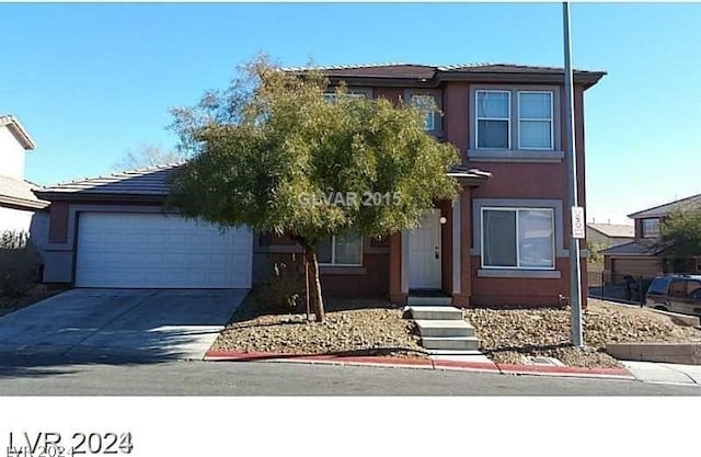 view of front of home with a garage