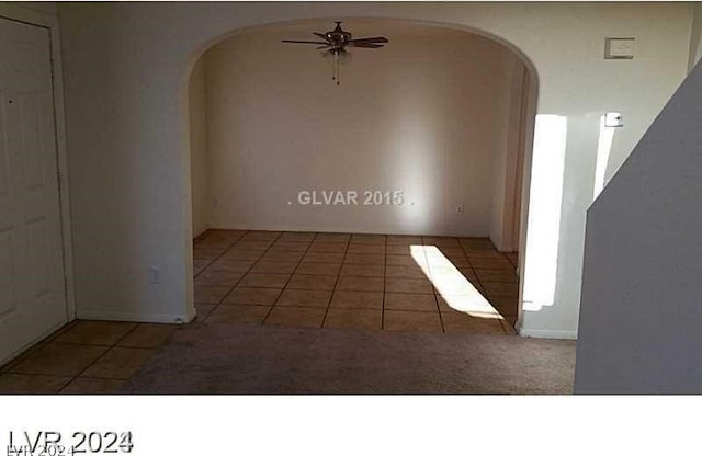 hallway featuring light tile patterned flooring