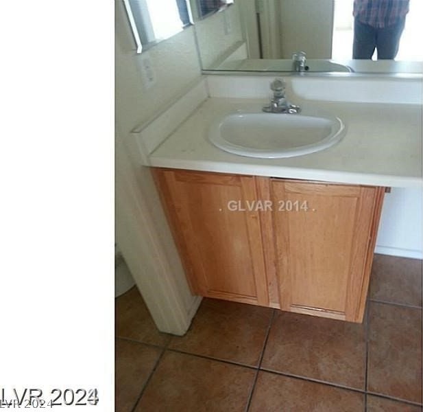 bathroom featuring vanity and tile patterned flooring