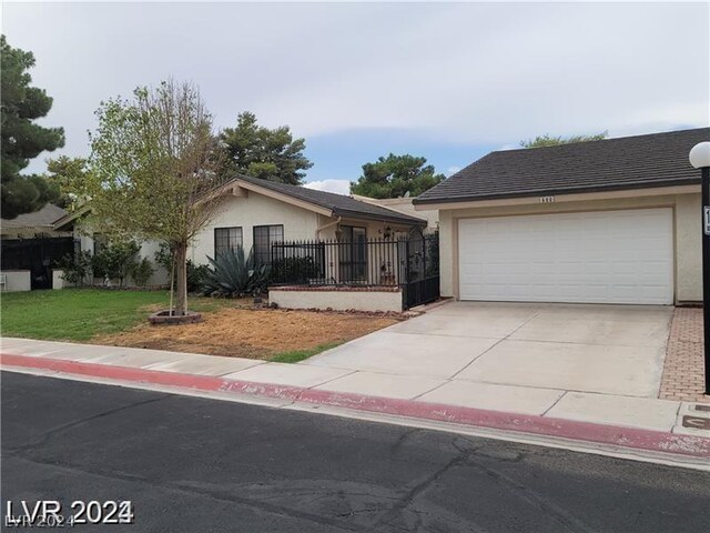 ranch-style home with a garage