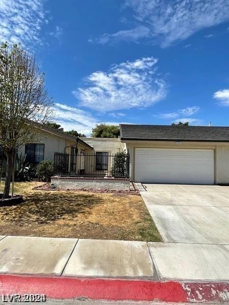 single story home with a garage