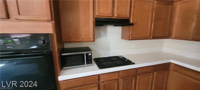 kitchen with black appliances