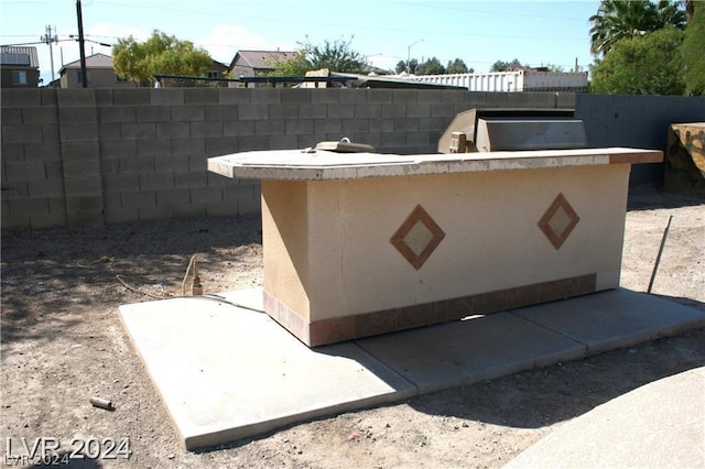 exterior space with a fenced backyard