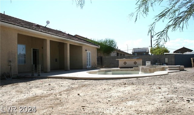 view of swimming pool featuring a fenced in pool, a patio, and a fenced backyard