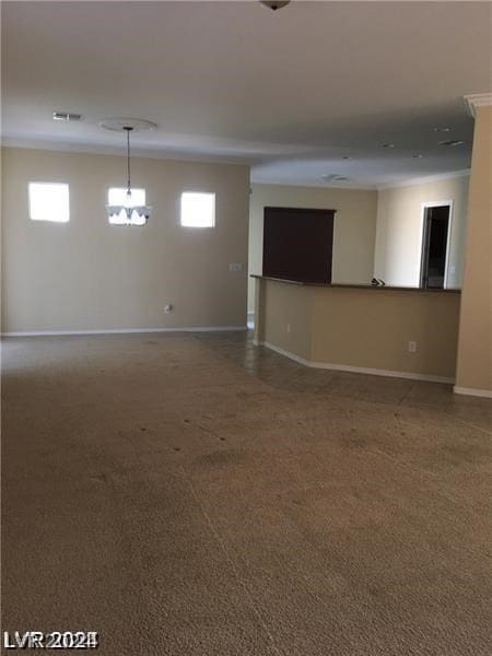 spare room featuring carpet floors