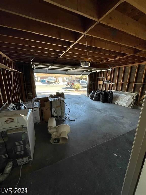 miscellaneous room with concrete flooring and a healthy amount of sunlight