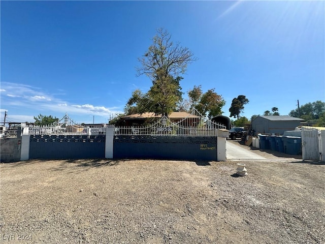 view of gate featuring fence