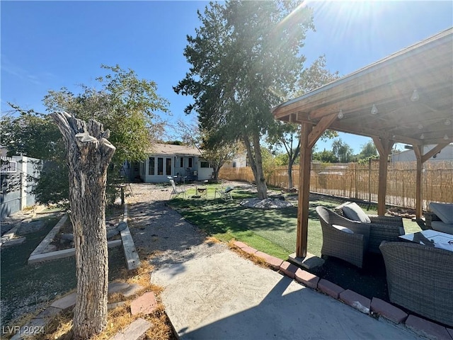 view of yard featuring a patio and a fenced backyard