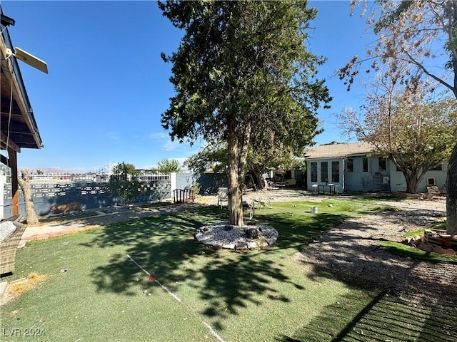 view of yard featuring fence