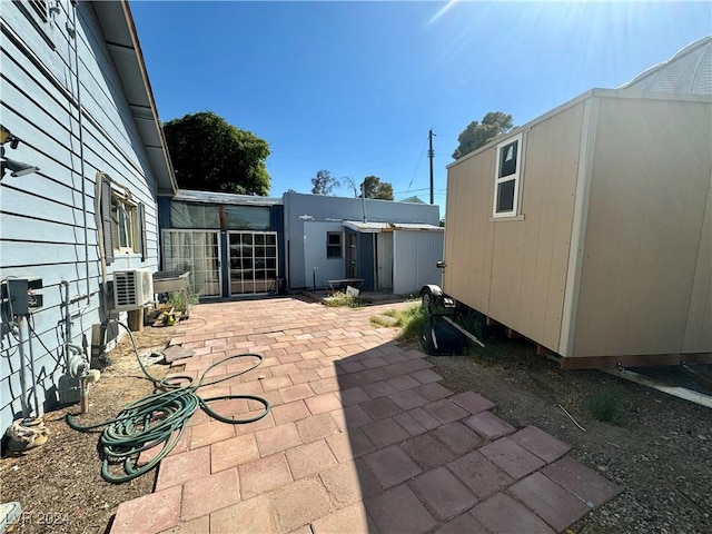 view of patio / terrace featuring an outdoor structure