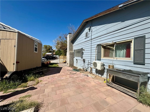 view of patio / terrace featuring an outdoor structure