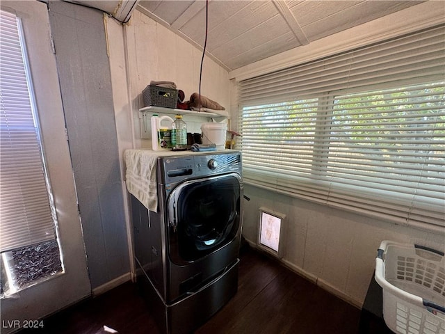 laundry area featuring laundry area, dark wood-style floors, and washer / clothes dryer