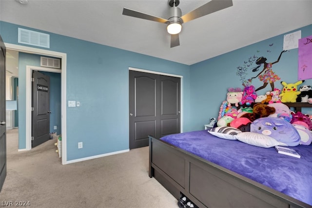 carpeted bedroom with ceiling fan