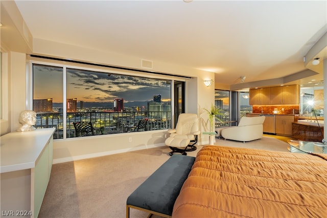 bedroom featuring light carpet