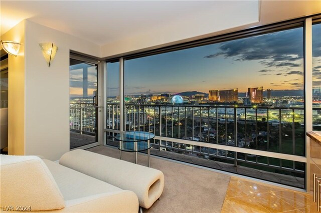 view of balcony at dusk