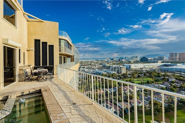 balcony featuring a city view