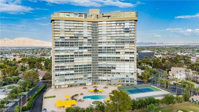 view of building exterior featuring a mountain view