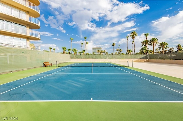 view of sport court with fence