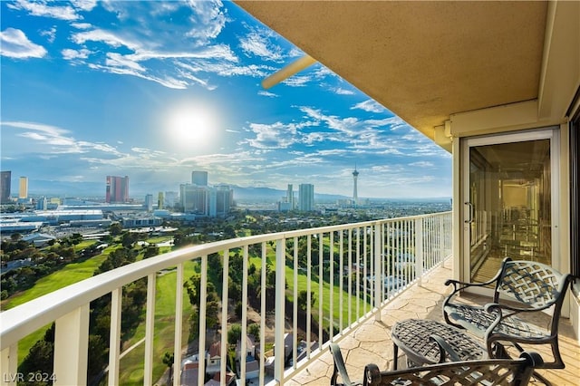 balcony featuring a city view