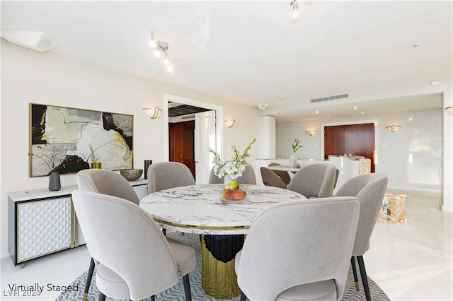 dining room with visible vents