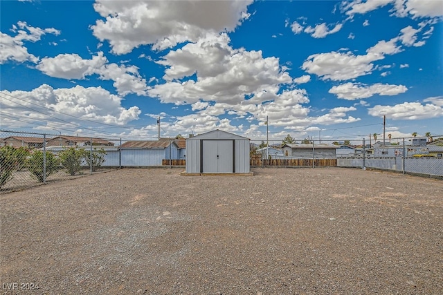 view of yard with a storage shed