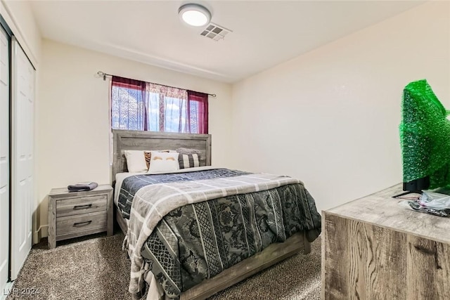 bedroom with dark carpet