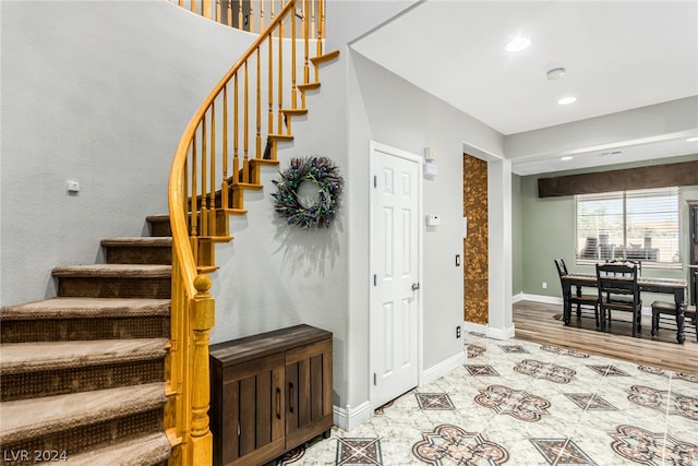 foyer entrance featuring light hardwood / wood-style floors