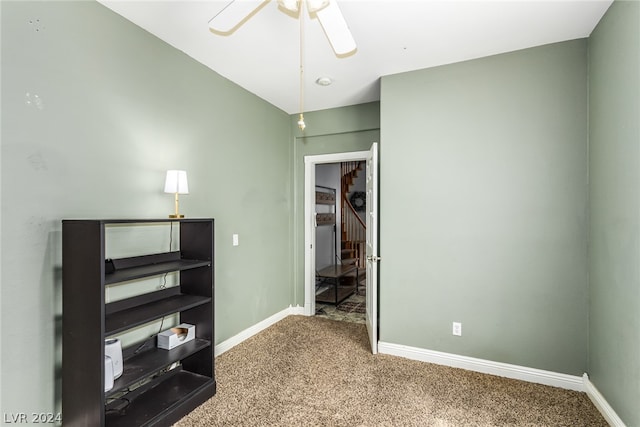 unfurnished bedroom featuring carpet flooring and ceiling fan