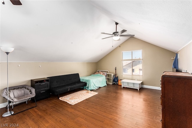 bedroom featuring ceiling fan, wood-type flooring, and vaulted ceiling