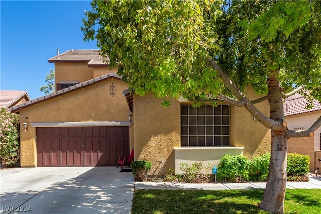 view of front of home with a garage