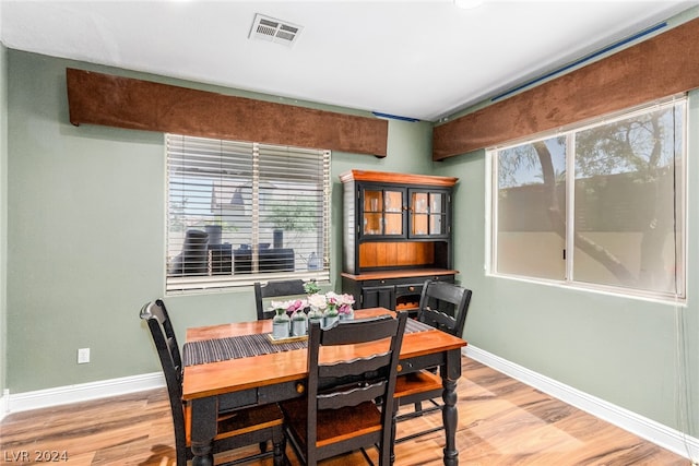 dining space featuring light hardwood / wood-style flooring