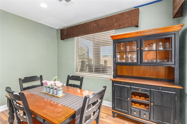 dining space featuring light hardwood / wood-style floors