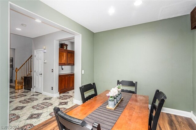 dining area featuring light wood-type flooring