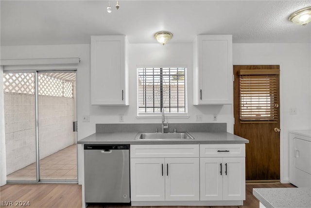 kitchen with sink, stainless steel dishwasher, and white cabinets