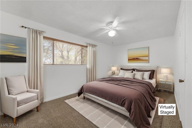 bedroom with ceiling fan and carpet floors