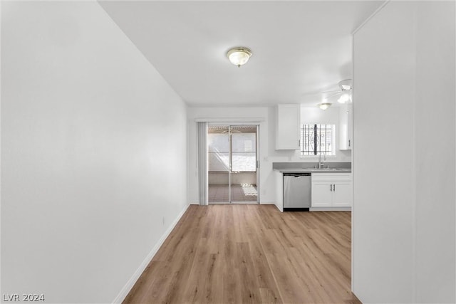 interior space with sink and light hardwood / wood-style floors