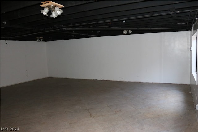 basement featuring tile patterned floors