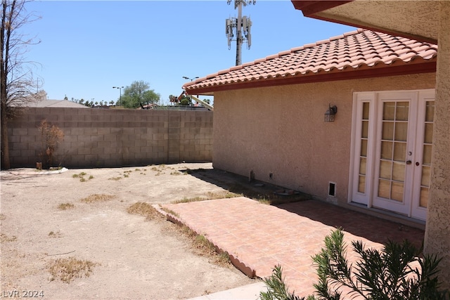 view of patio featuring french doors