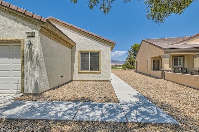 view of home's exterior featuring a garage