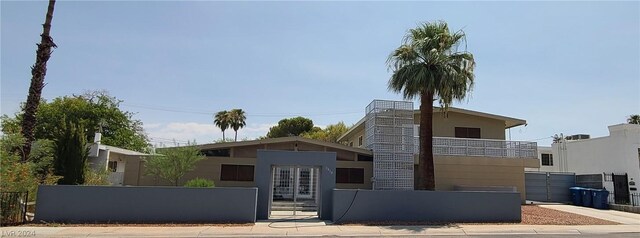 view of front facade with a balcony