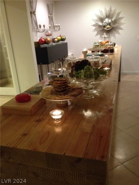 dining area featuring tile patterned flooring