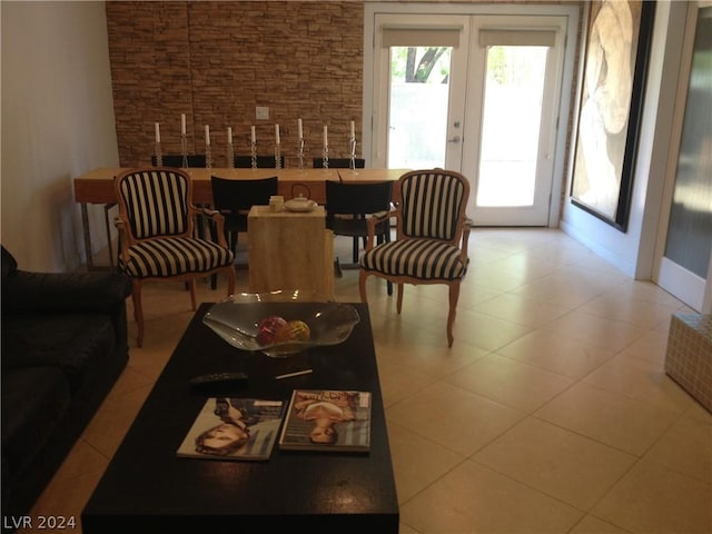 tiled living room featuring french doors