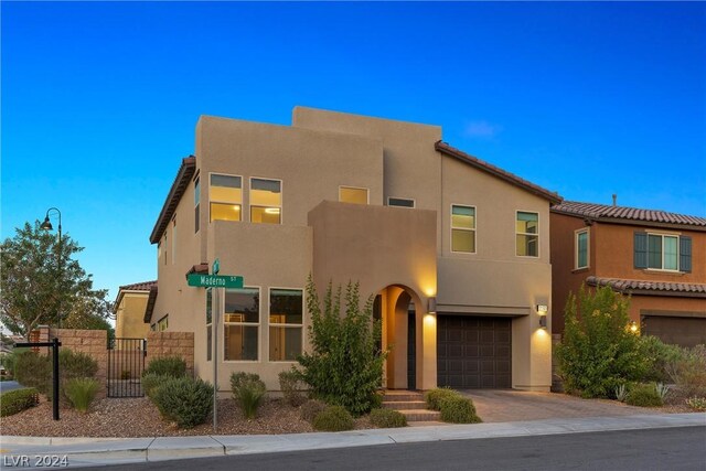 view of front of home with a garage