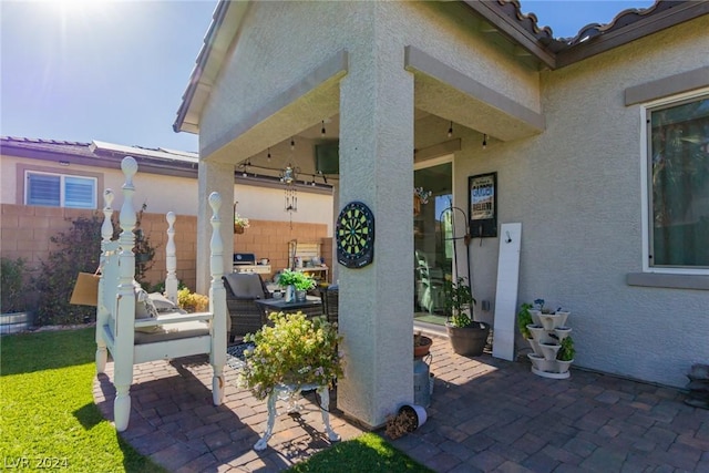 view of patio / terrace featuring fence