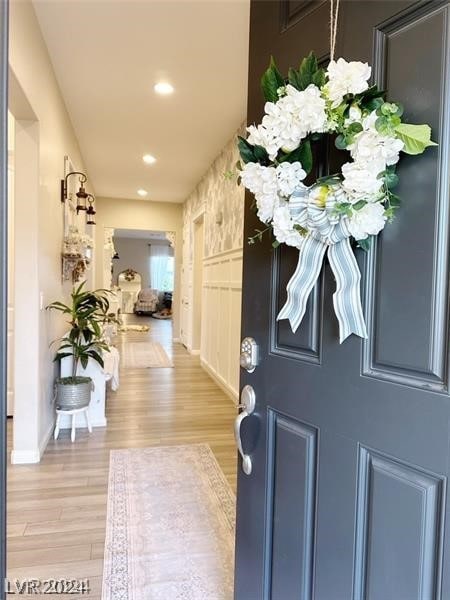 entryway with light hardwood / wood-style flooring