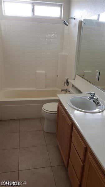 full bathroom with tile patterned floors, shower / bath combination, toilet, and vanity