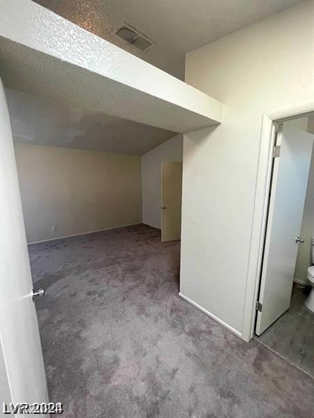 basement featuring carpet flooring