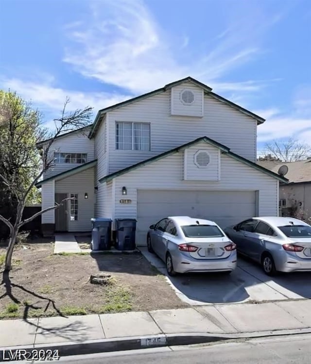 view of front property with a garage